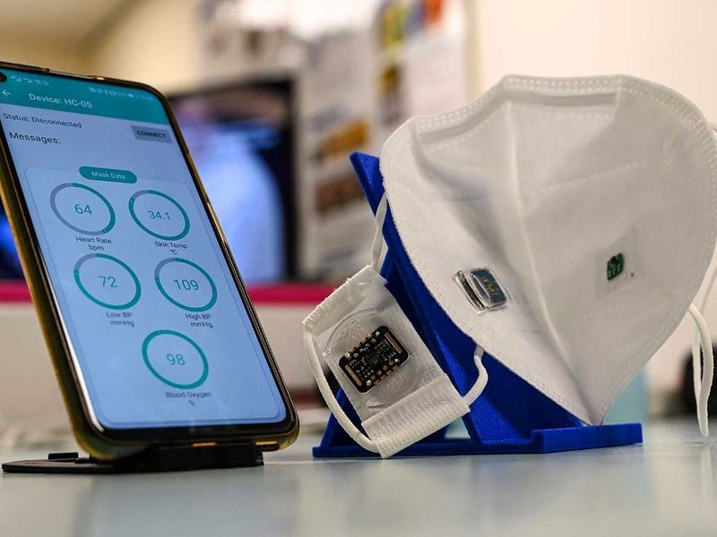 Singapore: From monitoring vital signs to filtering filthy air and even translating speech into other languages, the coronavirus-fuelled boom in mask-wearing has spawned an unusual range of high-tech face coverings. As masks become the norm worldwide, tech companies and researchers are rolling out weird and wonderful models to both guard against infection and cash in on a growing trend. Image Credit: AFP